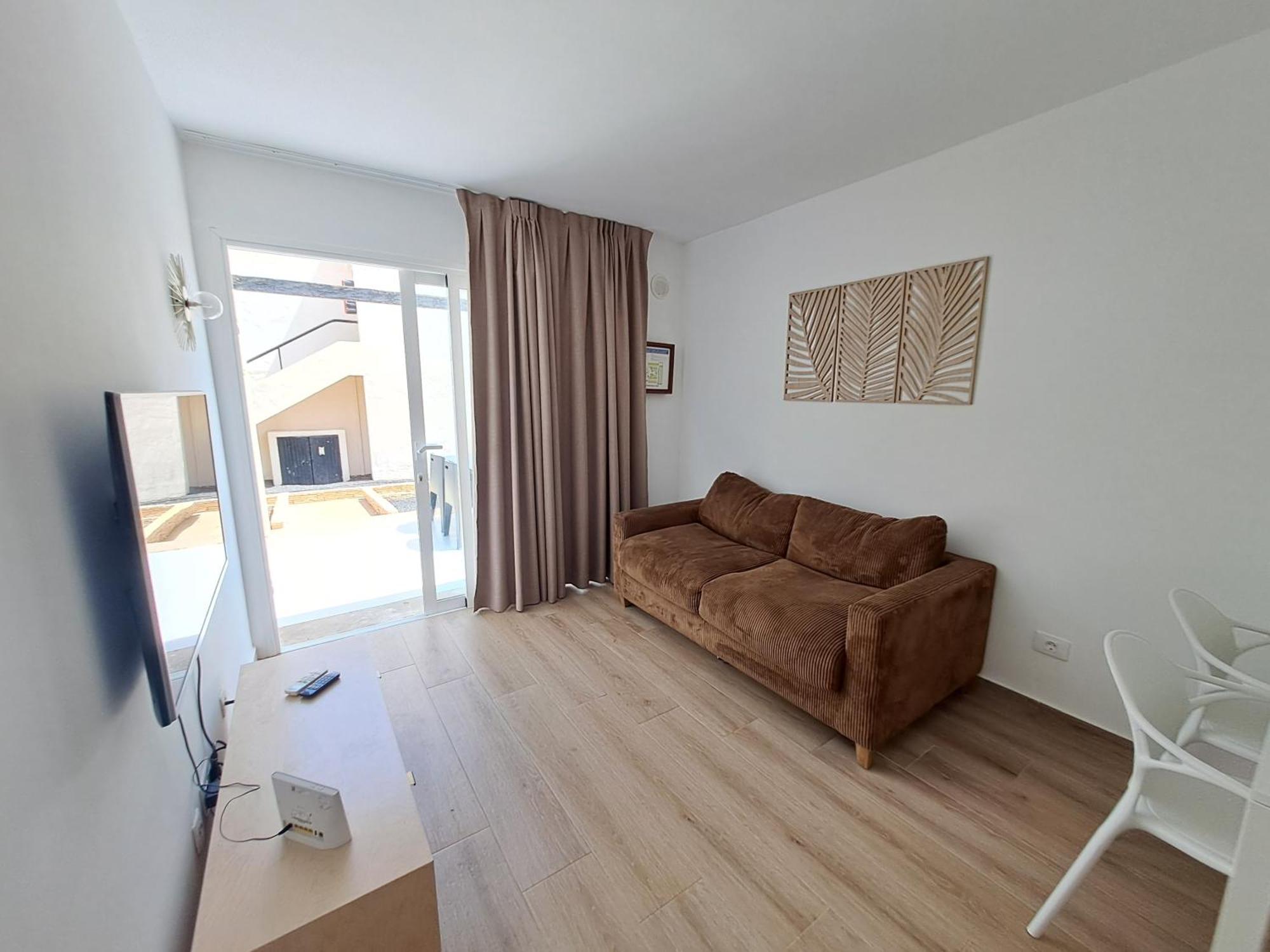 Homeforguest Apartamento Con Terraza Y Piscina En Коральео Экстерьер фото